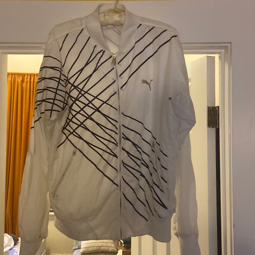 Vintage Puma windbreaker. White. In excellent condition.